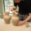 A close-up of the vase after two coats of paint and baking soda, showing a rough, stone-like texture.
