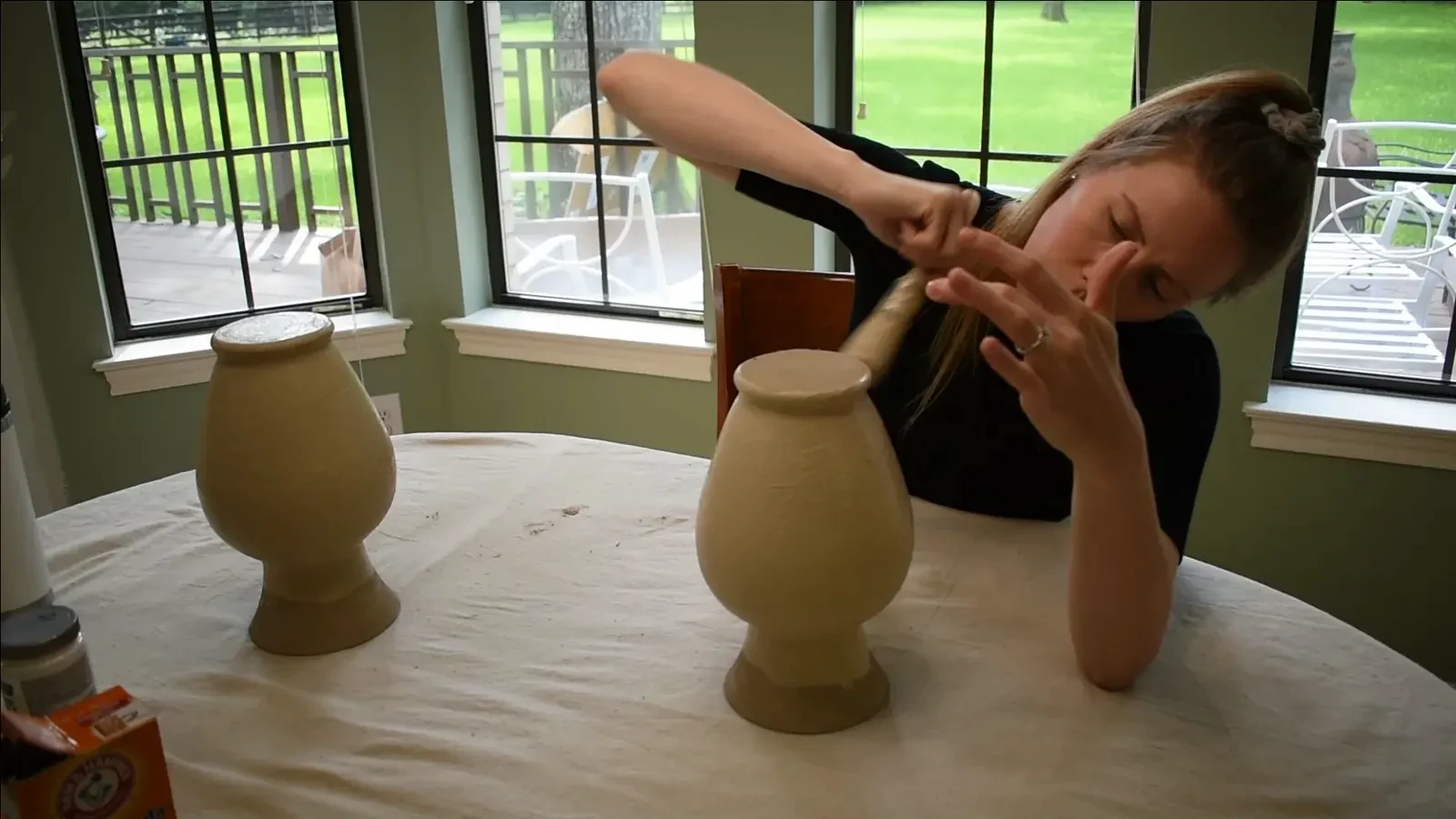 A vase with a full, even coat of the textured paint, showing the matte, stone-like finish.